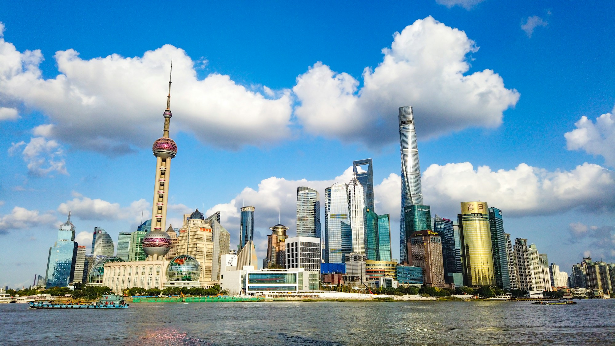 Shanghai’s Pudong skyline and Oriental Pearl Tower across the Huangpu River